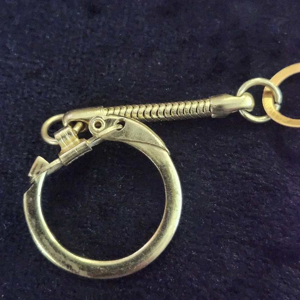vintage articulated Koi goldtone fish keychain featuring segmented Metal
